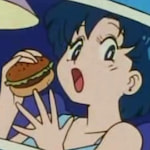 A photo of Sailer Mercury eating a burger, from the original Sailor Moon anime.